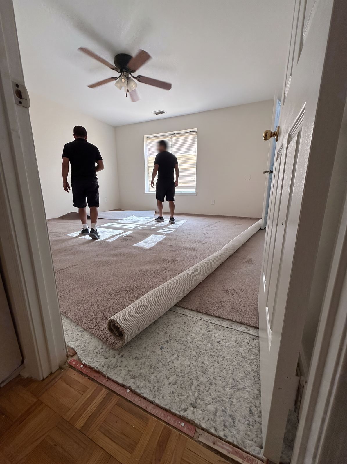 Worn flooring removed before the first tenant moves in.
